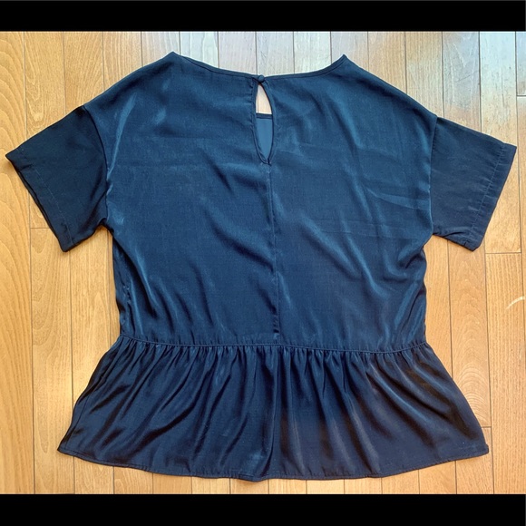 Shiny black peplum top! Loose fitting. Ripzone brand. Size small/medium. - Picture 3 of 5